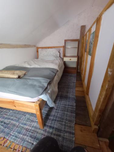 Postel nebo postele na pokoji v ubytování ecurie le buguet