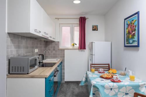 Kuchyň nebo kuchyňský kout v ubytování Gabriel Apartment Dubrovnik