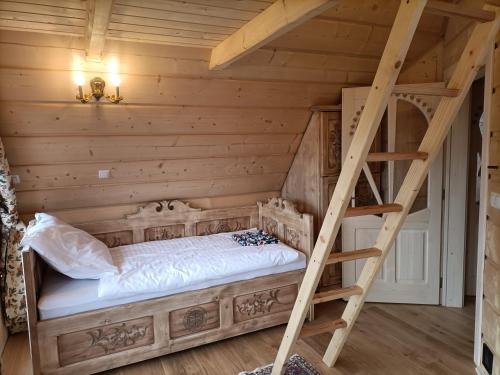 Ліжко або ліжка в номері Bajkowy domek