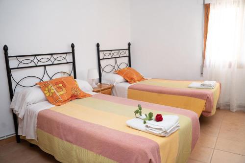 Postel nebo postele na pokoji v ubytování Casa Rural Villa de Yeste
