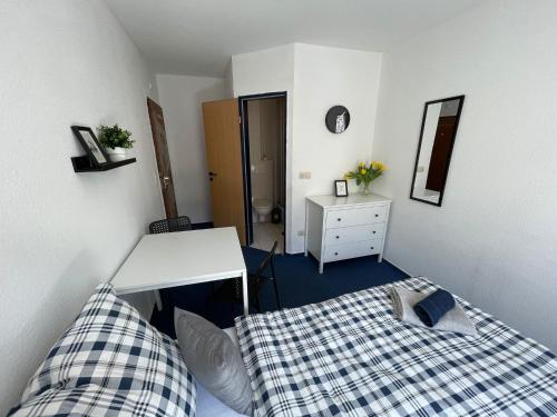 Ένα ή περισσότερα κρεβάτια σε δωμάτιο στο Gästezimmer Kreuzheide