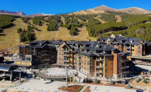 an aerial view of a resort with mountains in the background at Grand Colorado on Peak 8 in Breckenridge