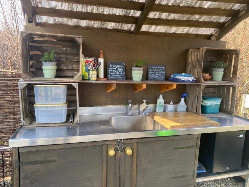 A kitchen or kitchenette at Belan Bluebell Woods Shepherds Hut