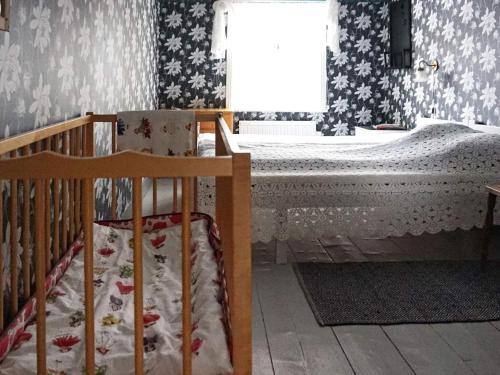 Ένα ή περισσότερα κρεβάτια σε δωμάτιο στο 6 person holiday home in ÅTVIDABERG-By Traum