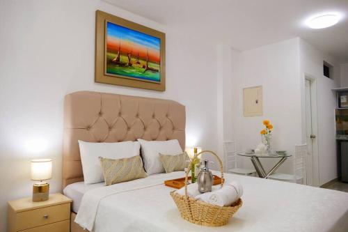 Een bed of bedden in een kamer bij Ecusuites Playas premium Room 2 - Villamil data