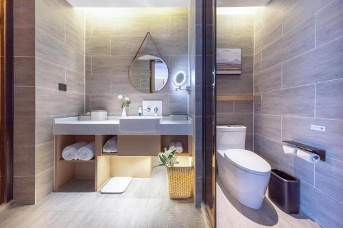 Ένα μπάνιο στο Atour Hotel Jincheng Development Lanhua Road