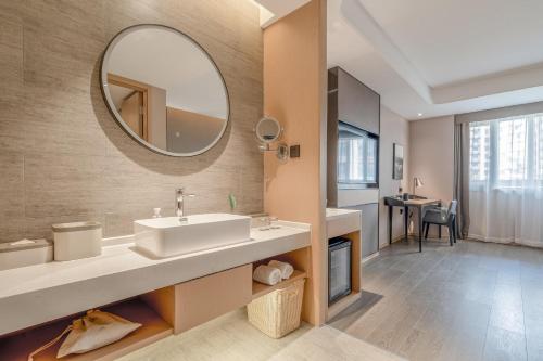 Ванная комната в Atour Hotel Taizhou Maoye World