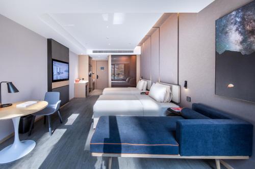 Χώρος καθιστικού στο Atour Hotel Nanjing Xianlin Unviersity Town