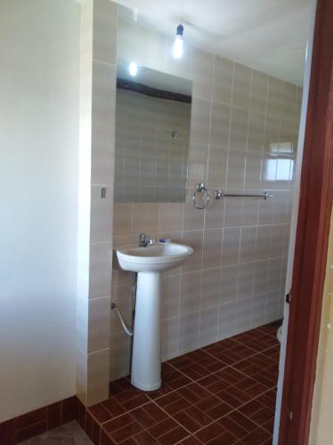 Ein Badezimmer in der Unterkunft Wara Uta Lodge
