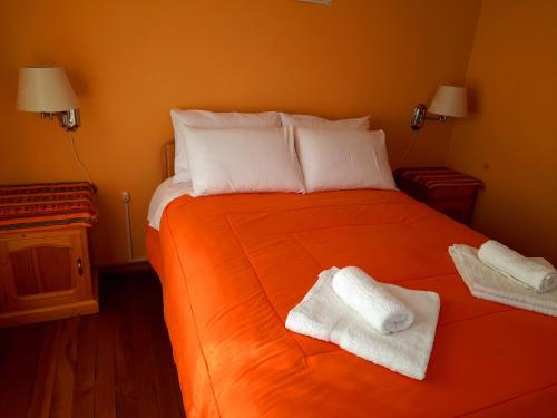 Ein Bett oder Betten in einem Zimmer der Unterkunft Wara Uta Lodge