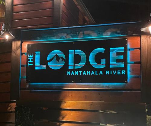 a sign for the lopes nantahala river at The Lodge Nantahala River in Bryson City