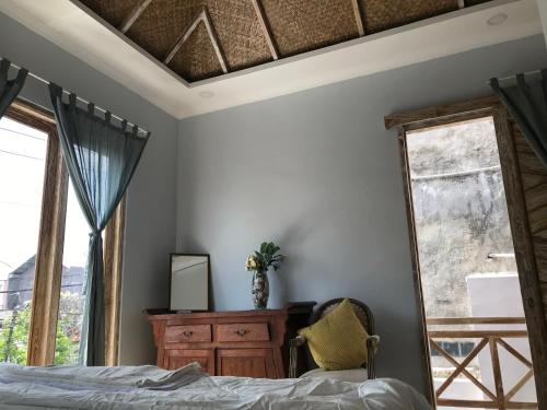 Katil atau katil-katil dalam bilik di Most Bali Malioboro Villa
