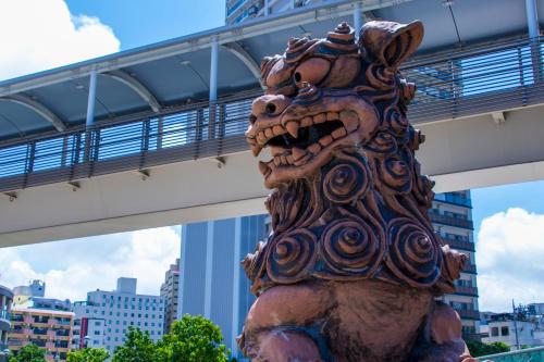 a dragon statue in front of a bridge at Hotel Royal Orion in Naha