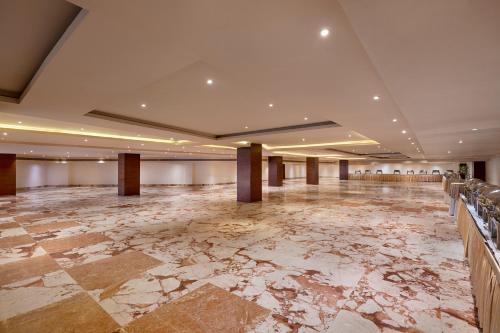 a large room with a marble floor and a large hall at Radisson Salem in Salem