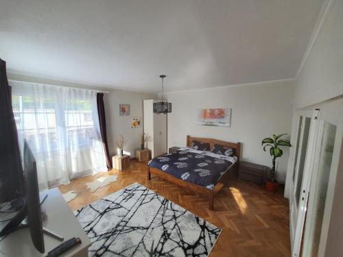 Postel nebo postele na pokoji v ubytování Andrea apartman