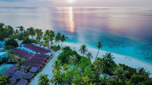 an aerial view of a resort on a tropical beach at Sabba Beach Suite , Fodhdhoo - Maldives in Velidhoo