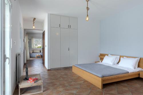 Postel nebo postele na pokoji v ubytování Lotos House - Unique Seaview Apartment