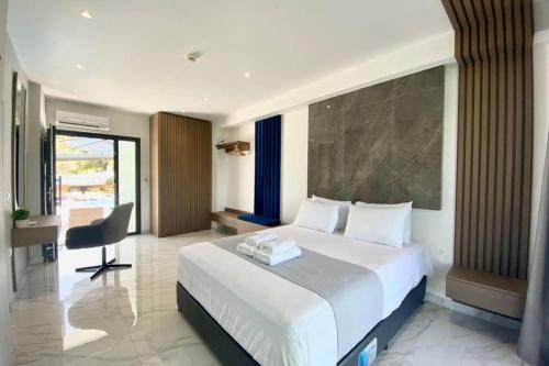 Posteľ alebo postele v izbe v ubytovaní V luxury Suites