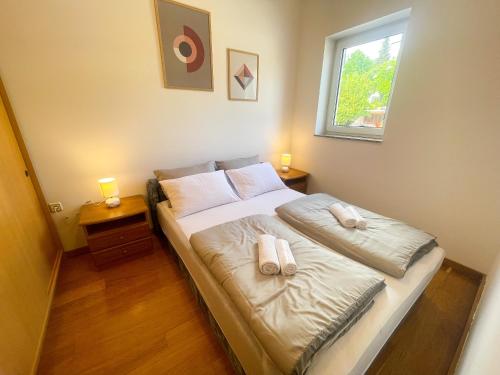 Posteľ alebo postele v izbe v ubytovaní Apartman La Mar