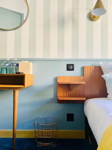 Ein Bett oder Betten in einem Zimmer der Unterkunft La Cascade