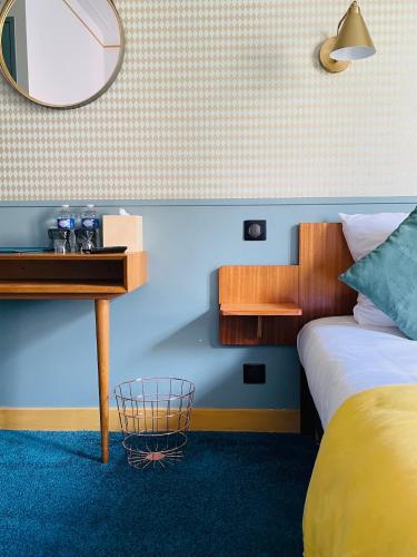 Ein Bett oder Betten in einem Zimmer der Unterkunft La Cascade