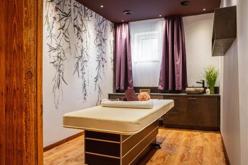 Fotografia z galérie ubytovania Voralpenhotel Schmoller v destinácii Sankt Georgen im Attergau