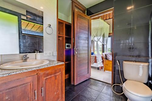 Ванная комната в Rumma Lanna Villa by Hombali