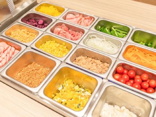 a tray filled with different types of food at LiVEMAX RESORT Miyahama Ocean View in Hatsukaichi