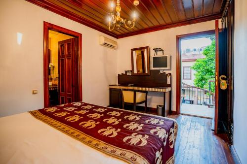 Postel nebo postele na pokoji v ubytování Mediterra Art Hotel Antalya