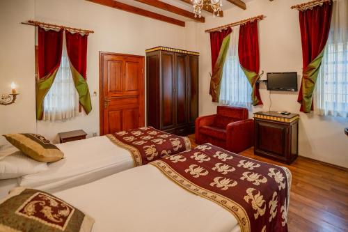 Postel nebo postele na pokoji v ubytování Mediterra Art Hotel Antalya
