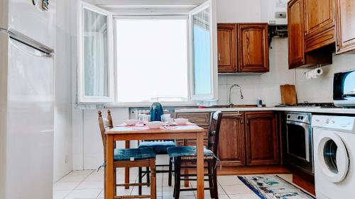 Kuhinja oz. manjša kuhinja v nastanitvi Appartamento Dario Campana 74 - Affitti Brevi Italia