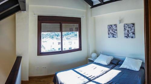 Posteľ alebo postele v izbe v ubytovaní Casas Rurales Pantano de La Minilla