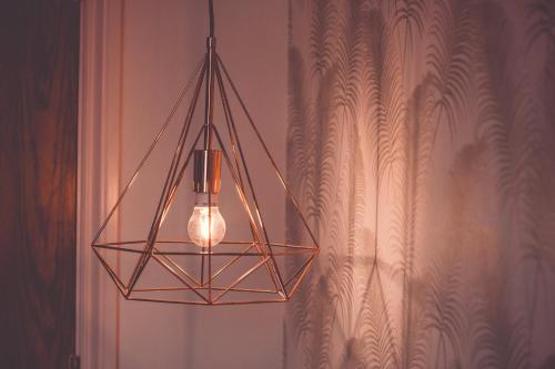 a chandelier hanging from a wall in a room at Eagle and Child, Ramsbottom in Bury