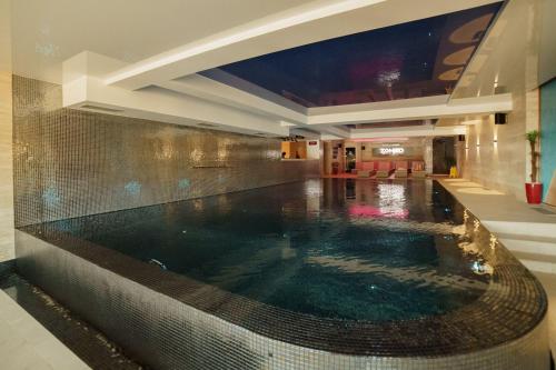 Piscina a Studio Unna o a prop