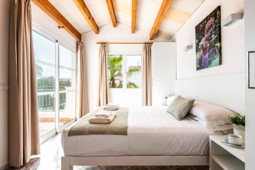 Ένα ή περισσότερα κρεβάτια σε δωμάτιο στο Villa Ingrid