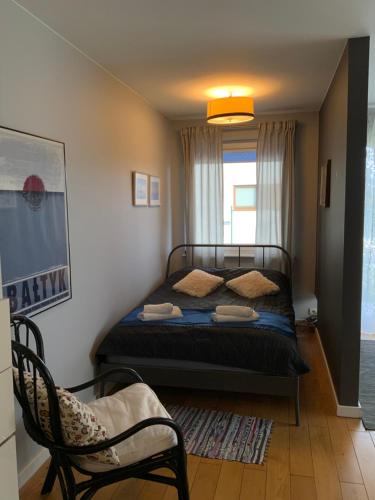 سرير أو أسرّة في غرفة في Apartament Stella Maris