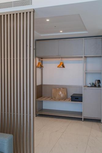 a bedroom with a bed in a room at THE ONE CAORLE - Hotel & Apartments in Caorle
