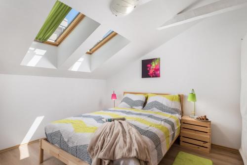 Posteľ alebo postele v izbe v ubytovaní Apartment Palach