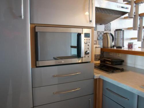 Dapur atau dapur kecil di Le Front de mer - studio lumineux esplanade Mers