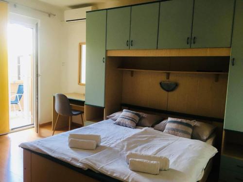 Postel nebo postele na pokoji v ubytování Meduza B&b