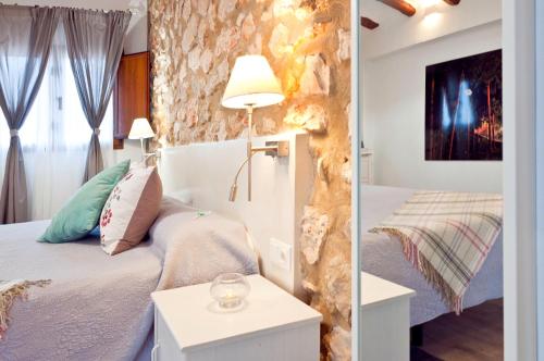 Cases Noves - Boutique Accommodation - Adults Onlyにあるベッド