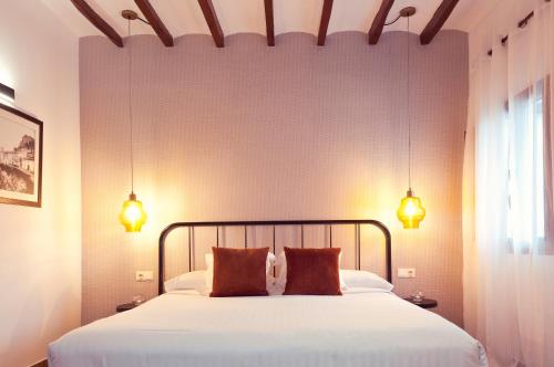 Cases Noves - Boutique Accommodation - Adults Onlyにあるベッド