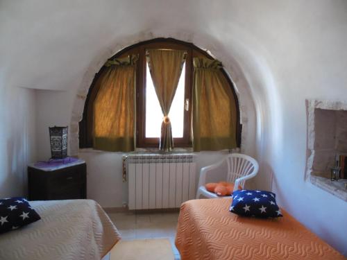 O zonă de relaxare la B&B Trulli sotto La Cupa