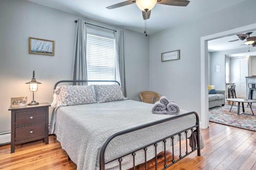 a bedroom with a bed and a living room at Mystic Refuge with Patio Less Than 1 Mi to Downtown! in Mystic
