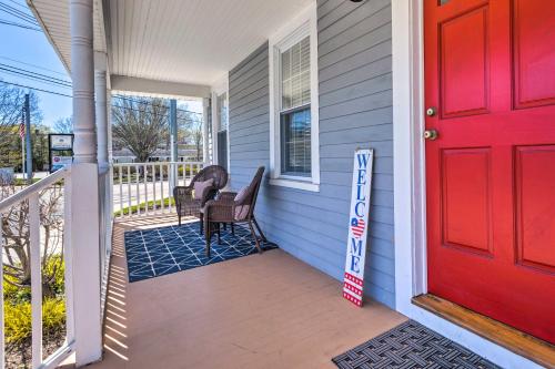 a front door of a house with a red door at Mystic Refuge with Patio Less Than 1 Mi to Downtown! in Mystic