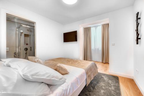 Postel nebo postele na pokoji v ubytování Adriatic Allure