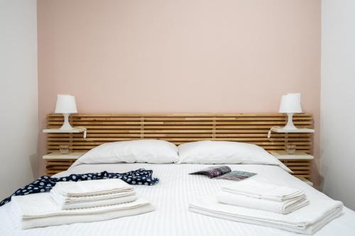 Ένα ή περισσότερα κρεβάτια σε δωμάτιο στο Via Venezia 32 Room