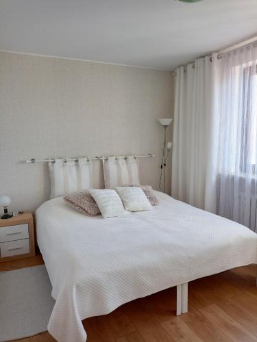 Posteľ alebo postele v izbe v ubytovaní Apartament nad Jeziorakiem
