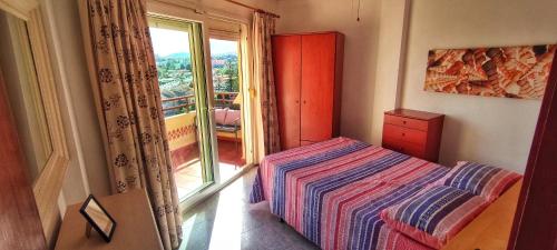 Postel nebo postele na pokoji v ubytování Apartamento con vistas al mar en Puerto Marina