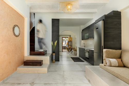 a hallway of a home with a living room at Kamares Boutique Residence in Rethymno Town